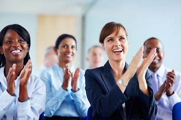 Image showing Corporate, people and applause for presentation at conference, workshop or seminar in New York. Diverse group, female manager and excitement in audience with smile, happy and clapping for speaker