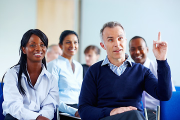 Image showing Businessman, hand and question for presentation at conference, workshop or seminar in New York. Diverse group, male ceo or boss with excited expression in audience for discussion, speaker or panel