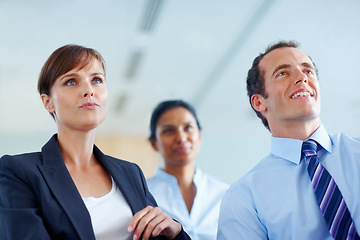 Image showing Businesspeople, together and listen to presentation at seminar, workshop or conference in boardroom. Woman, man and executive career with vision for future growth, planning or investment by low angle