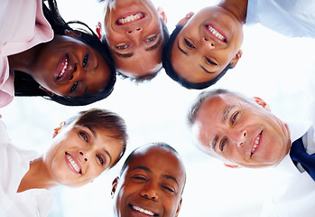 Image showing Portrait, huddle or business people with support, cooperation and professionals with partnership, team building and solidarity. Diversity, face or group circle with low angle and company development