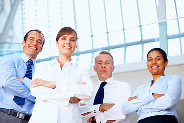 Image showing Happy business people, portrait and professional team in confidence at office for leadership or management. Group of executive employees smile with arms crossed in teamwork or mission at workplace