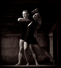 Image showing Ballet, dance and couple in monochrome or performance practice for choreography, artist for creative expression. Man, woman and contemporary moving or abstract for together form, training for concert