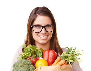 Image showing Portrait, vegetables and woman with nutrition, smile and girl isolated on white studio background. Face, person and model with healthy food, glasses and diet plan with mockup space, happy or wellness