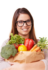 Image showing Portrait, vegetables and woman with nutrition, wellness and girl isolated on white studio background. Face, person and model with healthy food, glasses and diet plan with mockup space, happy or vegan