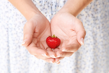 Image showing Hands, woman and holding strawberry fruits for detox, vegan diet and eco nutrition of fresh ingredients. Closeup of red berries, healthy food and sustainable benefits of vitamin c, wellness and care
