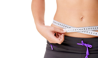 Image showing Woman, measuring tape or stomach for weight loss in studio with fitness, wellness or body progress. Person, belly or waist with target for exercise, training or workout on white background and mockup