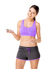 Image showing Woman, portrait or music in studio for fitness, workout or exercise with sportswear, earphones and smile. Person, face or happy for radio, audio or podcast with mockup or training on white background