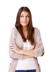 Image showing Thinking, confused and woman with arms crossed shrug in studio with questions on white background. Why, doubt and female model with asking body language, dont know or how to gesture, guess or oops