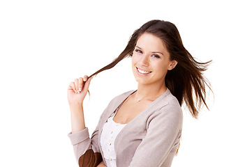 Image showing Hair, twirl and portrait of woman with fashion for casual style in white background or studio. Happy, person and girl relax with confidence, pride and smile in mockup space or thinking of haircut