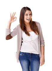 Image showing Woman, ok and smile in portrait, approval and agreement in studio, winner and white background. Female person, face and emoji or icon, yes and like or success, promotion and good job or well done