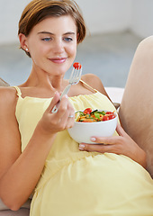 Image showing Pregnant woman, salad and smile on sofa for health, nutrition and wellness in living room of apartment. Person, vegetables or happy on couch of lounge for relax, pregnancy and healthy diet with fiber