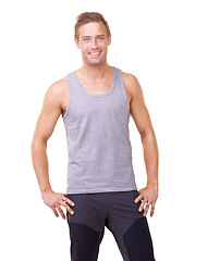 Image showing Portrait, man and hands on hips for fitness, studio and happy with exercise wellness in gym clothes. Model, usa and smile face with commitment to health body, training and relax by white background