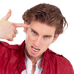 Image showing Portrait, finger gun and crazy with a man in studio isolated on a white background for anger or frustration. Fashion, temple or problem and an aggressive young person pointing to his face or head