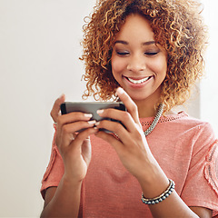 Image showing Phone games, relax or happy woman on break playing online gaming, subscription or connection. Designer, video gamer or African person with mobile app in workplace for streaming multimedia with smile