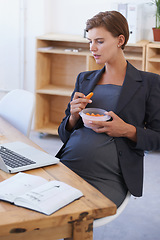 Image showing Business woman, pregnant and eating carrots for healthy diet, nutrition or food at office. Female person or employee in pregnancy or maternity with laptop and natural organic vegetables at workplace