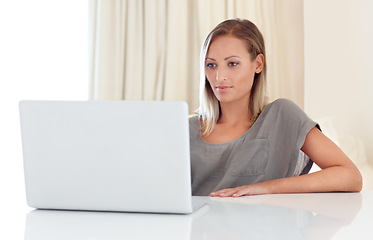 Image showing Woman, laptop and remote work from home with analysis, idea and thinking for freelance copywriting job. Girl, computer and entrepreneur with planning, schedule or brainstorming with reading in house