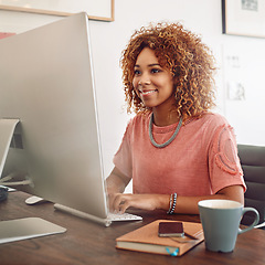 Image showing Workplace, happy or designer with computer for research, editing or copywriting on blog or website. Startup, smile or African woman in office working on internet update, networking or reading news