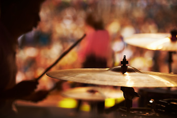 Image showing Drums, playing and closeup of hands, music festival and concert in outdoors, talent and audience. Band, performance and entertainment for crowd, instrument and rhythm for people, sound and rock