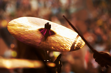 Image showing Drums, performance and closeup of hands, concert and music festival in outdoors, talent and audience. Band, playing and entertainment for crowd, instrument and rhythm for people, sound and rock