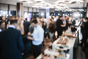 Image showing Blurred image of businesspeople at banquet business meeting event. Business and entrepreneurship events concept