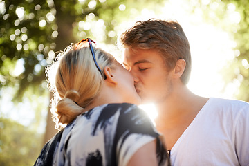 Image showing Couple, kiss and love in outdoors, commitment and loyalty for marriage in nature or forest. Man, woman and bonding or together outside, connection and affection on romantic date at park on vacation