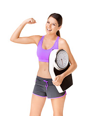 Image showing Scale, portrait and woman flex with weight loss goal, success and smile from health progress. Workout, fitness and sport training of a female person in studio with white background and wellness