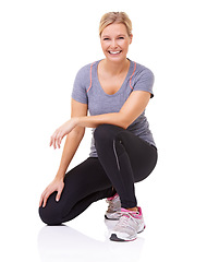 Image showing Studio, portrait and woman in gym clothes with happy, health wellness and fitness with mockup. Person, smile and face with training or sports fashion, exercise gear and sneakers by white background