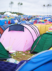 Image showing Tents, campsite and music festival on outdoor field or mess pollution, garbage from party crowd. Shelter, group and entertainment dance gathering event or waste land for holiday, dirt in environment