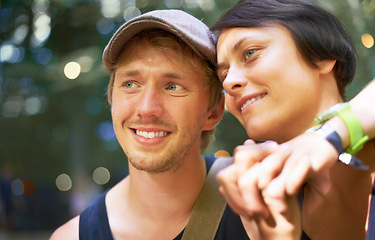 Image showing Smile, love and couple holding hands outdoor in nature, care and loyalty, bonding and together on bokeh. Happy man, woman and support in healthy relationship, romance and connection, trust or date