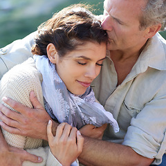 Image showing Couple, forehead kiss and hug with love, peace or happy on holiday with gratitude for partnership. Mature, man and woman relax in embrace outdoor on vacation together or show affection and care