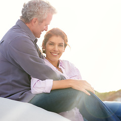 Image showing Mature, couple and portrait of hug on holiday, vacation or outdoor sunshine in morning with nature. Happy woman, smile and man with love, respect and gratitude for marriage and partnership together