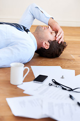 Image showing Businessman, stress and headache or burnout, floor and exhausted or mental health, paperwork and overwhelmed. Male person, migraine and tired or frustrated, rest and fatigue for mistake and fail