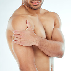 Image showing Shoulder pain, hands and fitness man in studio with muscle problem, arthritis or fibromyalgia on white background. Arm, injury and athletic male model with osteoporosis, stress or sports mistake