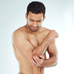 Image showing Arm pain, stress and asian fitness man in studio with muscle tension, arthritis or inflammation on white background. Elbow, injury and Japanese male model with fibromyalgia, osteoporosis or emergency