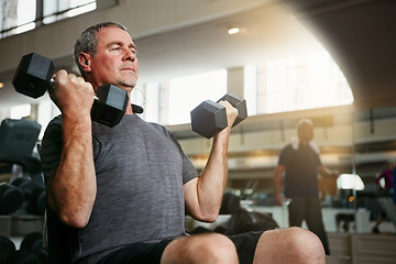 Image showing Fitness, gym and senior man with dumbbells for weightlifting, challenge or cardio workout, training or bodybuilding. Biceps, arms and elderly person with hand weight for strength, mindset or exercise