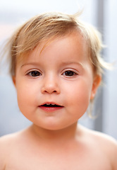 Image showing Baby, portrait and child or smile in nursery with relax, healthy and development for growth or nurture in home. Kid, person and face with waking up, carefree and calm expression in bedroom of house