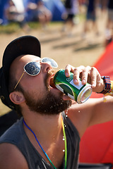 Image showing Man, drinking and beer in outdoors, music festival and alcohol and relaxing at party or camp. Male person, fun and crazy in nature, outside and freedom or energy for celebration at social event