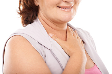 Image showing Woman, care and hand on chest in support with empathy, kindness and cardiology wellness in white background. Studio, closeup or person gesture to heart, healthcare and check blood pressure or pulse