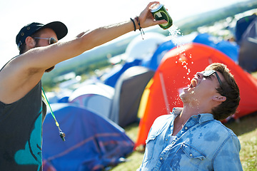 Image showing Beer, festival or drunk friends drinking together, alcohol beverage or outdoor social event. Summer music concert, pouring drinks or excited people with freedom, can or party games in celebration