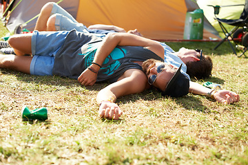 Image showing Sleeping, drunk or friends on field in festival hangover in social celebration, party or concert. Fatigue, grass or tired people with alcohol drinks or can on outdoor music event or holiday vacation