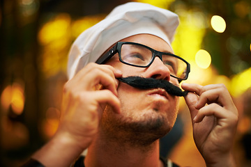 Image showing Man, chef and mustache at outdoor festival in fashion or style with glasses in forest or park. Young male person with fake moustache, spectacles and hat at music concert, event or carnival in nature