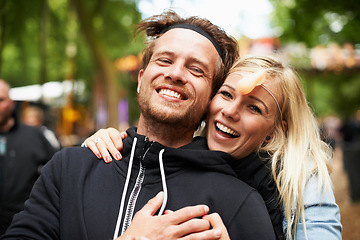 Image showing Happy couple, portrait and hug at festival for love, care or support at outdoor party, DJ event or music. Man and woman smile in embrace, affection or trust for festive celebration or summer break
