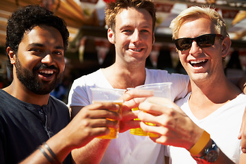 Image showing Happy man, portrait and friends cheers at music festival, bar or event for summer party or DJ concert. Male person or group smile with beer in toast for friendship at carnival or outdoor celebration