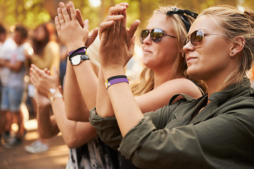 Image showing Hands, applause and woman friends at a music festival outdoor for a concert, party or event of celebration. Audience, crowd or young people at a carnival together for performance or entertainment