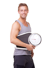 Image showing Fitness, scale and portrait of happy man with confidence, workout and wellness in studio. Healthy motivation, exercise and body of athlete with weight loss measurement isolated on white background.