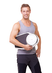 Image showing Fitness, scale and portrait of man with smile, workout and wellness with healthy pride in studio. Health, exercise and body of happy person with weight loss measurement isolated on white background.