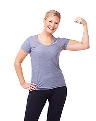Image showing Woman, portrait and flex or smile in studio for fitness, wellness or workout progress and sportswear. Person, face or arm and strength or training for weight loss and healthy body on white background