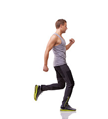 Image showing Man, running and fitness in studio for workout, training and energy with wellness, muscle health and cardio. Sports model, sprinter or runner with exercise for race or challenge on a white background