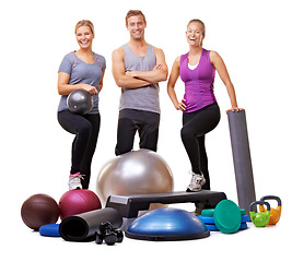 Image showing Workout equipment, group of people and fitness studio for training, wellness and support of personal trainer, Happy portrait of women and sports man, health and pilates exercise on a white background