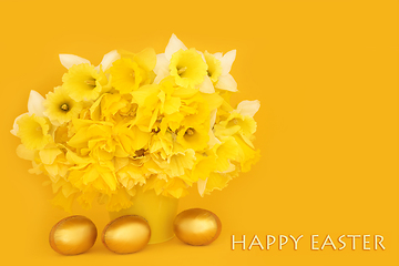 Image showing Happy Easter with Gold Eggs and Spring Daffodil Flowers